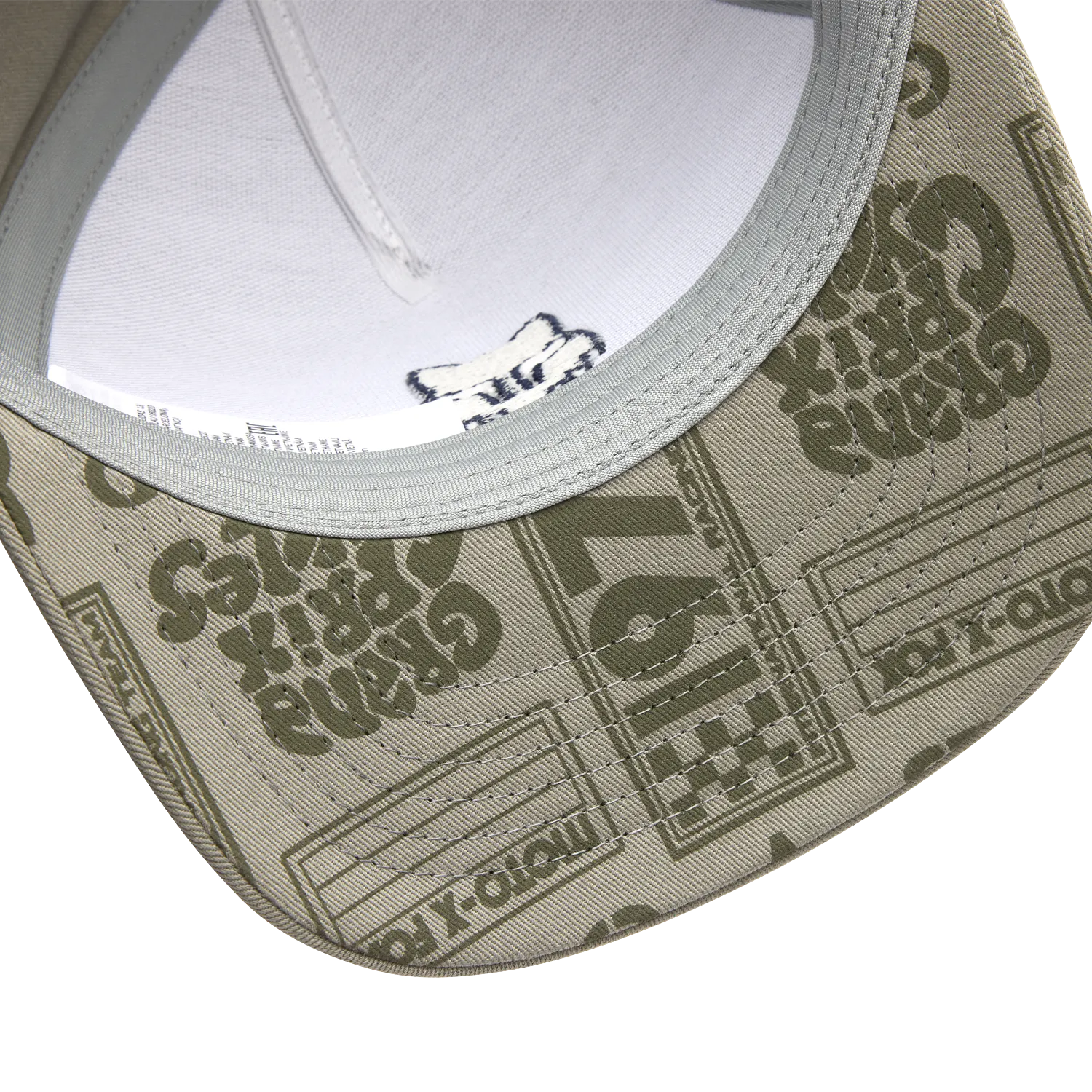 Inside view of the CIRCA 74 SNAPBACK HAT (ADB) featuring printed artwork under the brim.