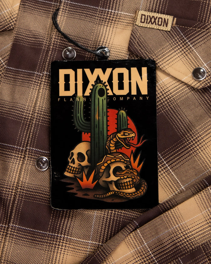 MEN'S SIDEWINDER FLANNEL (Brown) | DIXXON label featuring skulls and cacti on a brown plaid background.