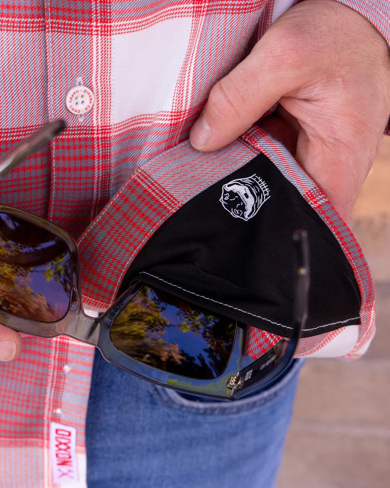 MEN'S HAPPY LAND FLANNEL (Red/White) | DIXXON features sunglasses tucked in pocket, showcasing stylish plaid design.
