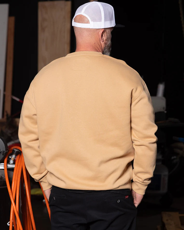 MEN'S POCKET CREWNECK (Khaki) | DIXXON showcased in a relaxed fit, featuring a soft fleece lined interior, view from the back.