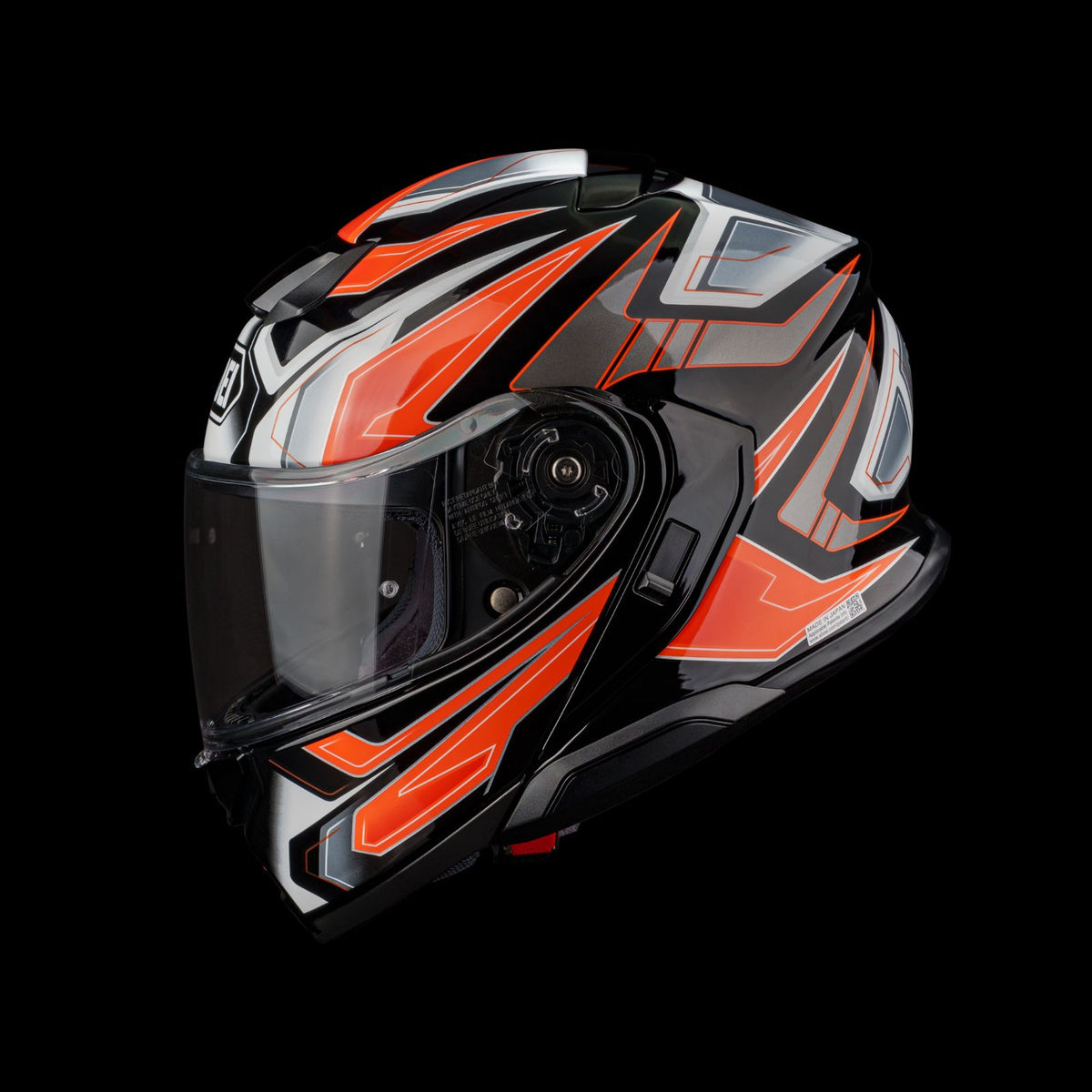 NEOTEC 3 MODULAR HELMET (ANTHEM TC-8) | SHOEI in black and orange with visor on a dark background.