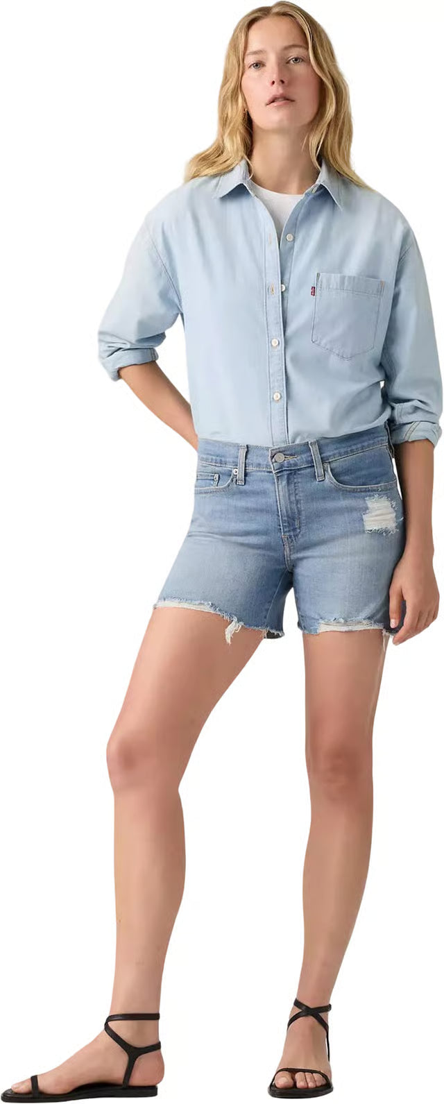WOMEN'S MID LENGTH SHORTS (Update Just a Fan) | LEVI'S model wearing denim shorts and a light blue shirt.